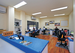 A purpose built sales room catering for up to 6 salesmen and their workstations